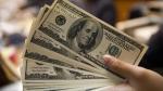 El dólar amagó desplome, pero terminó cerrando a $1.460